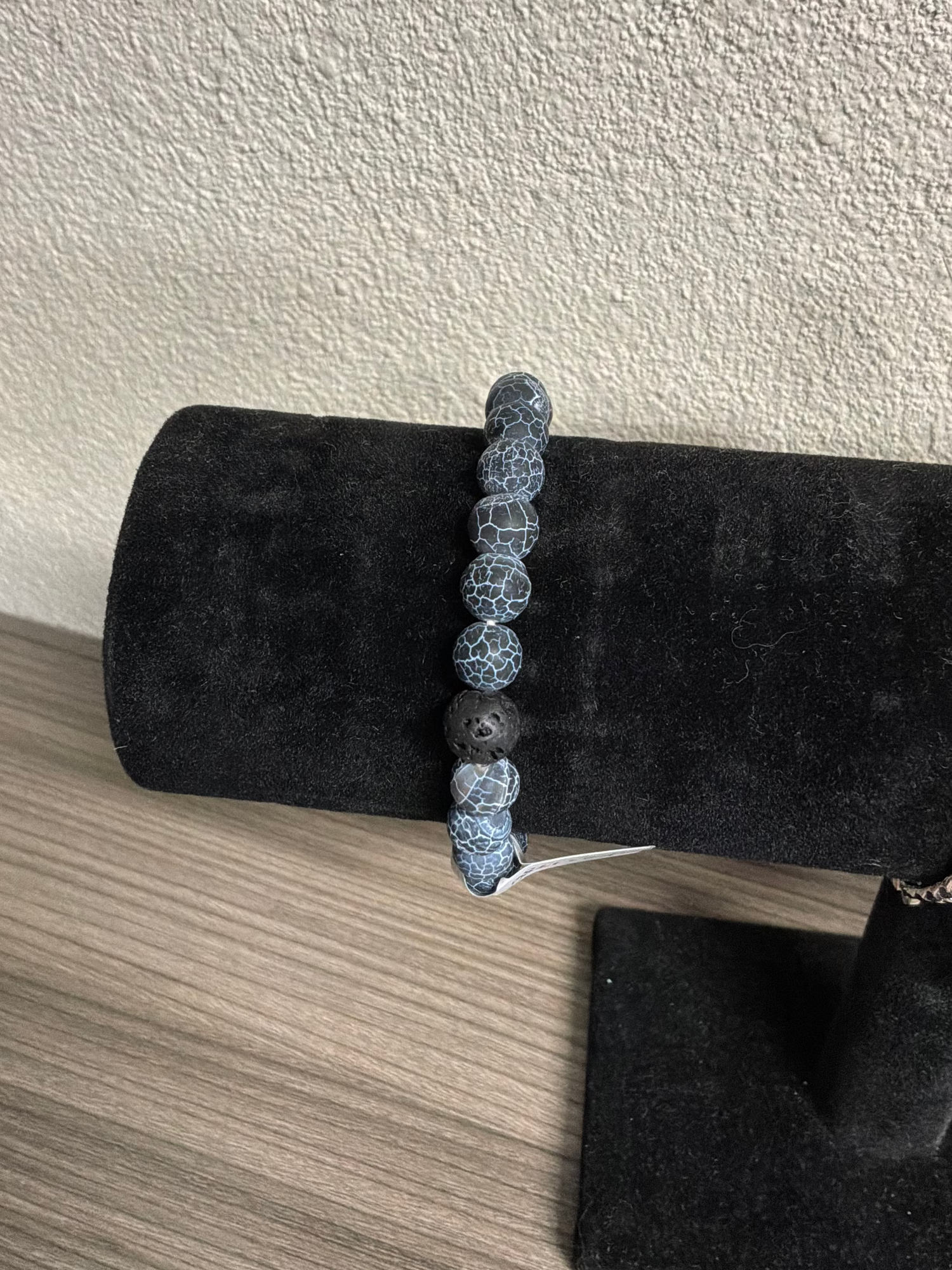 Adjustable faux leather bracelet with rivets